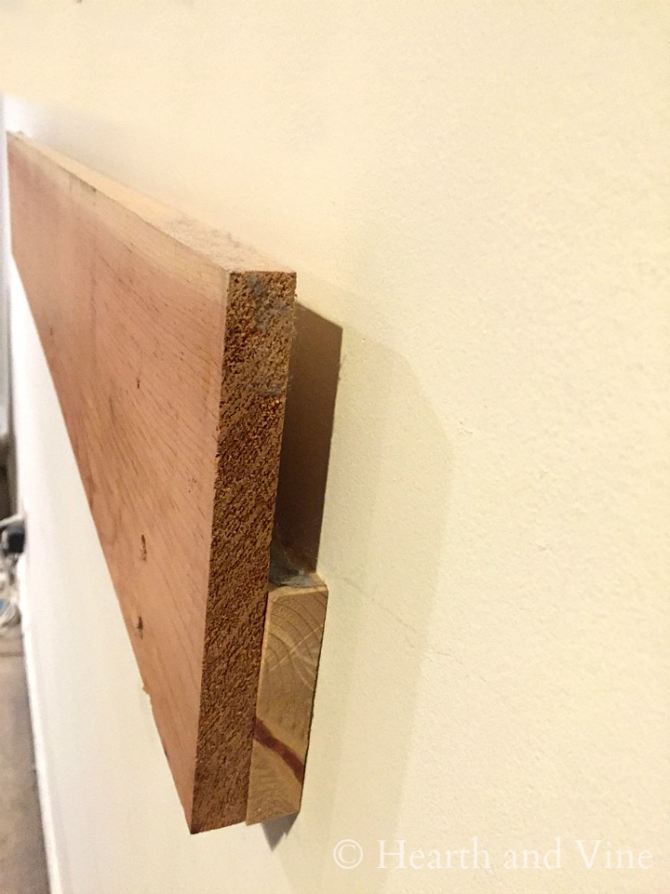 Cleat for hanging door headboard