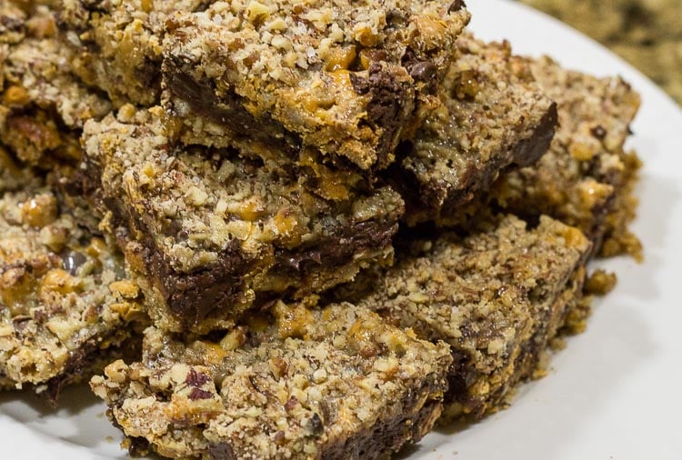 salted caramel chocolate bars with pecans and a pretzel crust