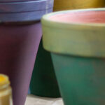 Painted pots with earth pigment powders.
