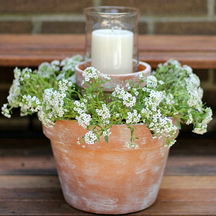 Flower pot centerpiece with candle