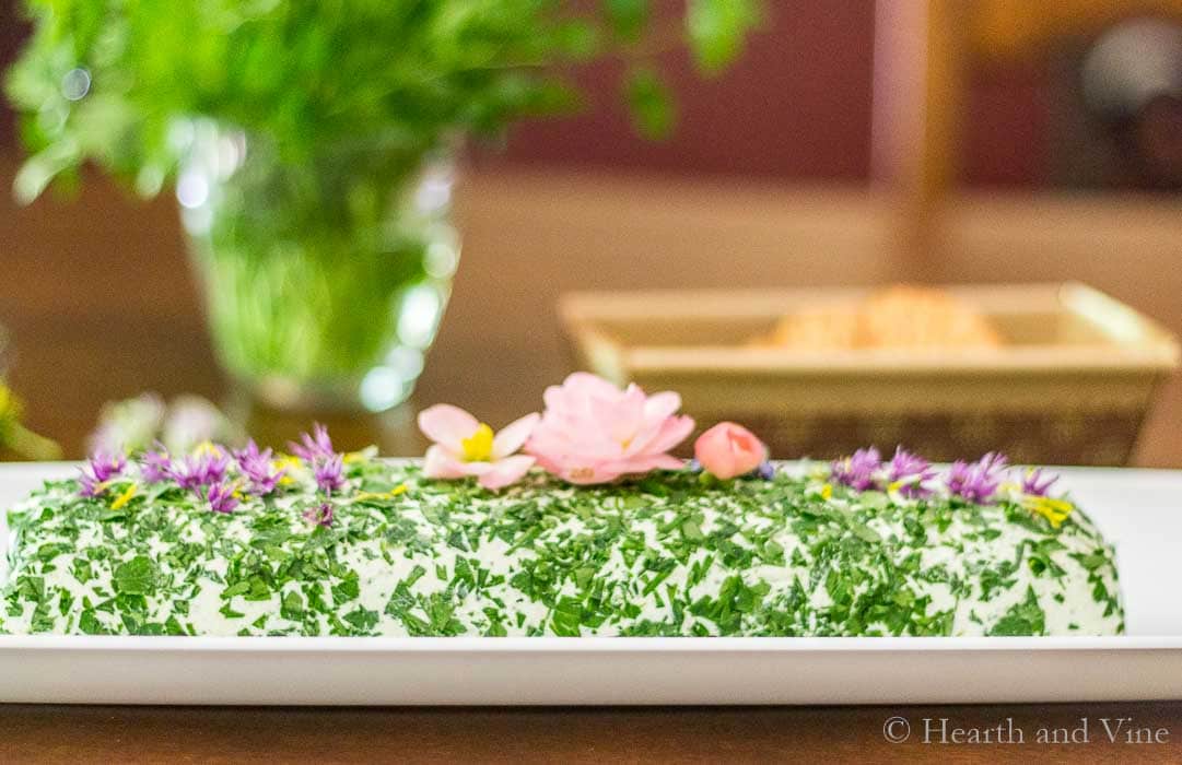 Herbed cheese spread with edible flowers