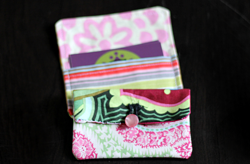 Fabric card holder with a button closure