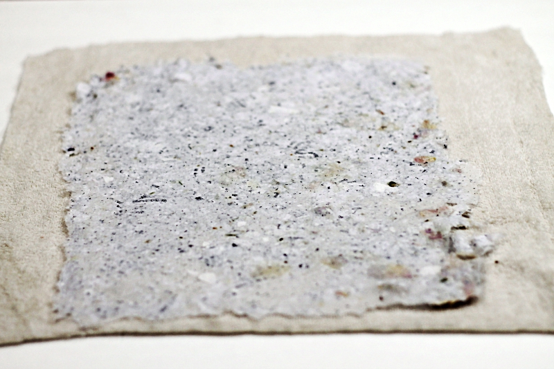 Fresh handmade paper pulp drying on a cloth