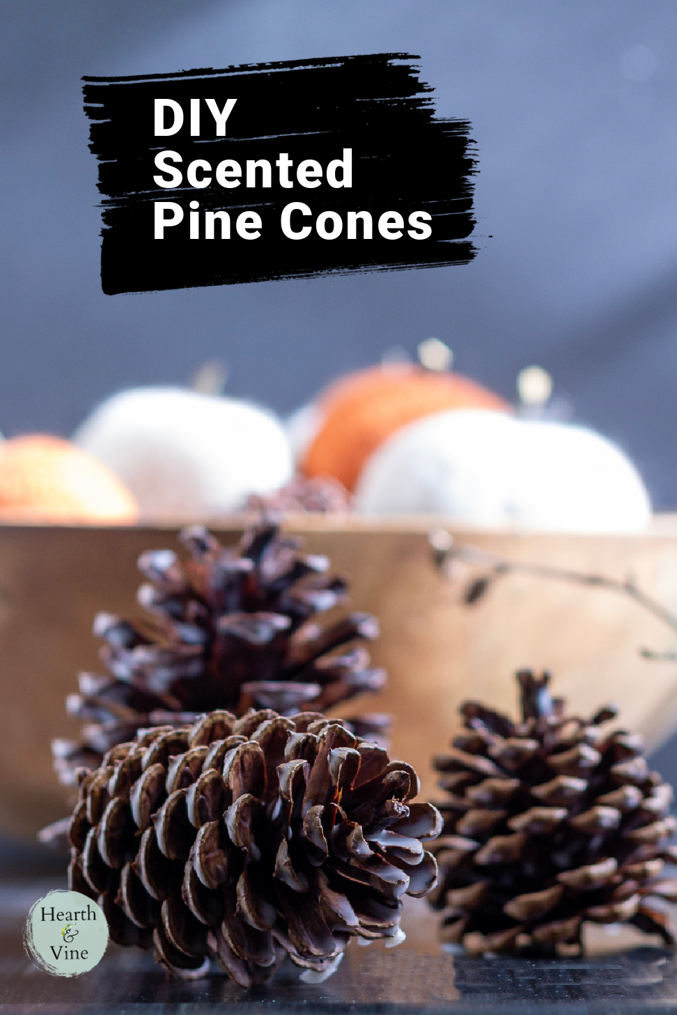 Pumpkin spice scented pine cones with wax on a table.