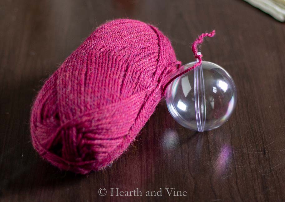 Yarn with plastic ornament