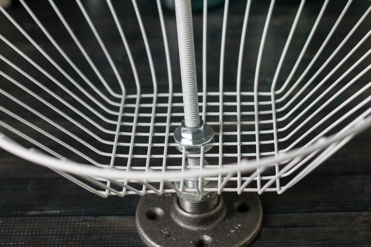 detail of nuts and washers holding basket