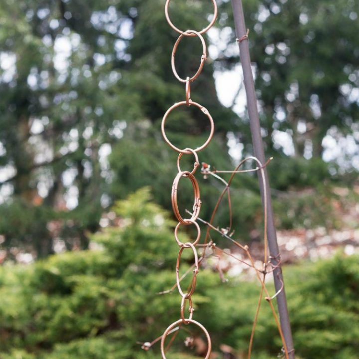 Handmade copper rain chain on shepherd's hook
