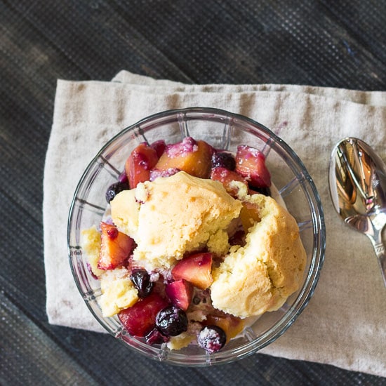 Bowl of blueberry peach cookie dough cobbler 