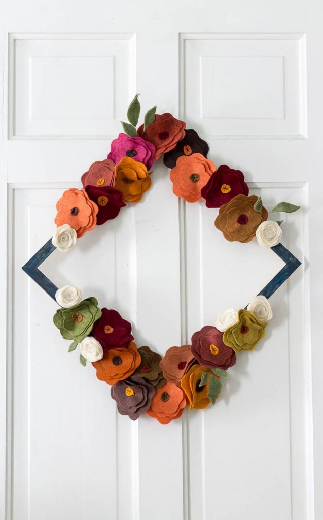 Felt Flower Wreath Tutorial - On white door tall diamond