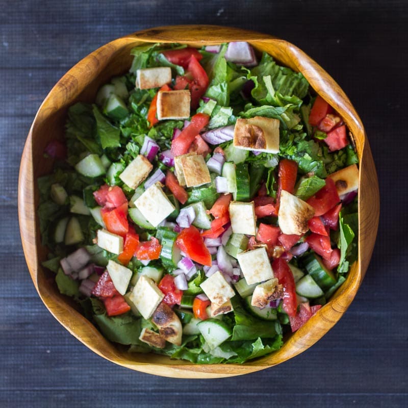 Fattoush Salad in a large wooden bowl.