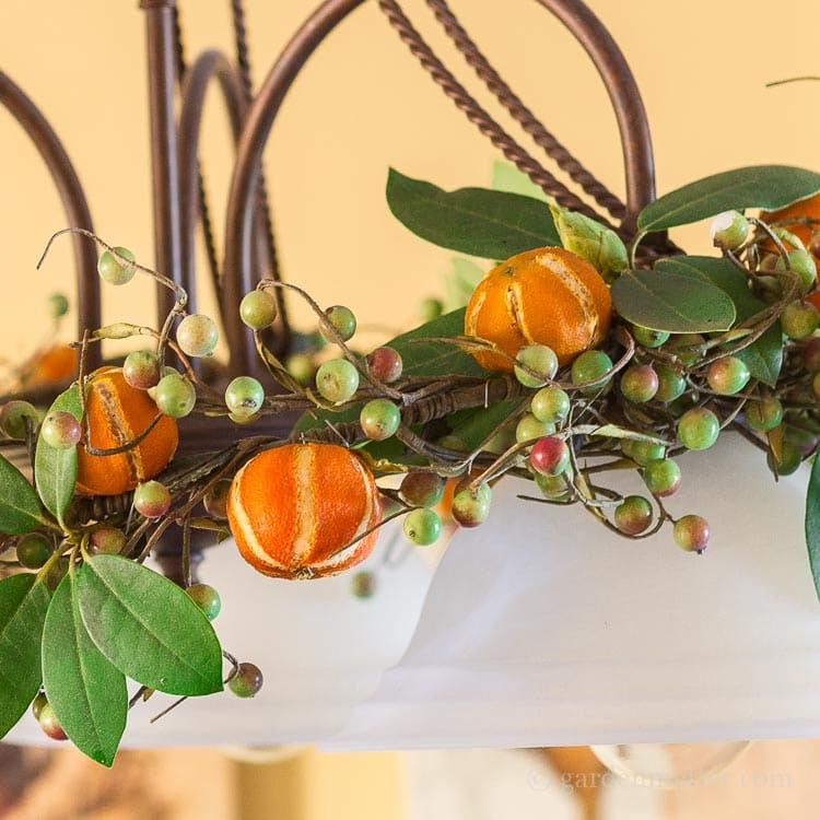 Dried citrus ornaments on chandelier