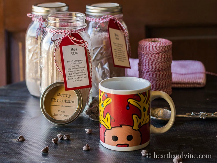 Mug with mason jar mix in background