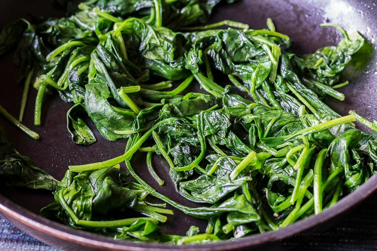 WIlted spinach in pan