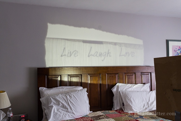 DIY projector to cast words on a wall.