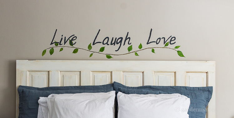 Budget bedroom makeover with handpainted wall art.