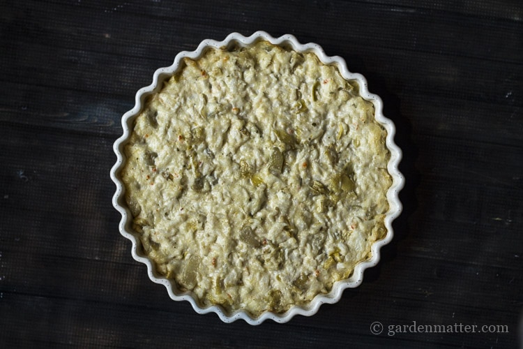 Cheesy crab artichoke dip is great appetizer to bring to any party.