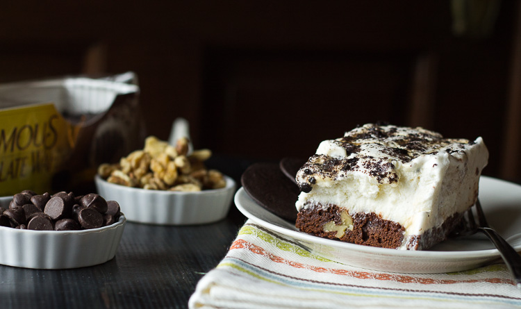 Chips and slice of brownie cake