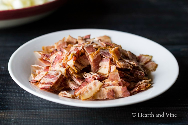 Cut up bacon on plate