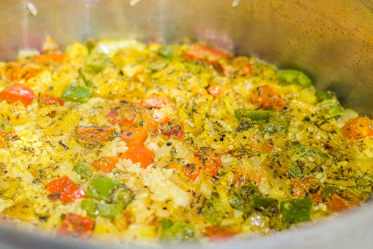 Vegetables and rice in saucepan