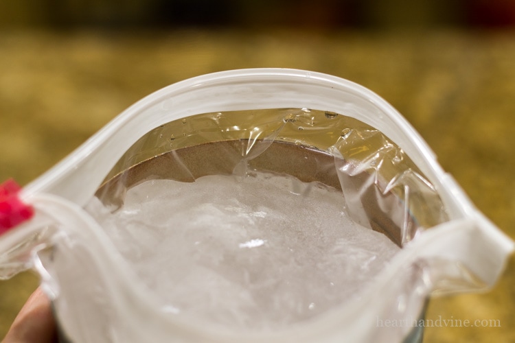 Bag of ice in tin can.