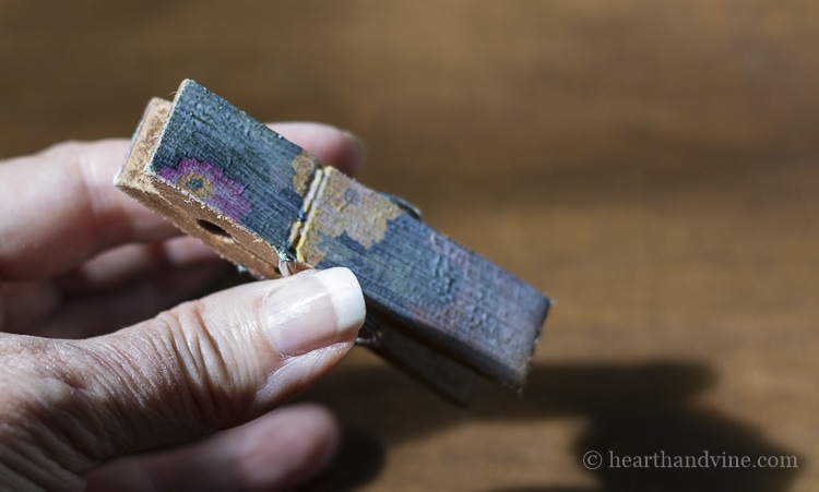 Decoupaged clothespin with Mod Podge top coating.