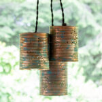 Trio of tin can pendant lights.