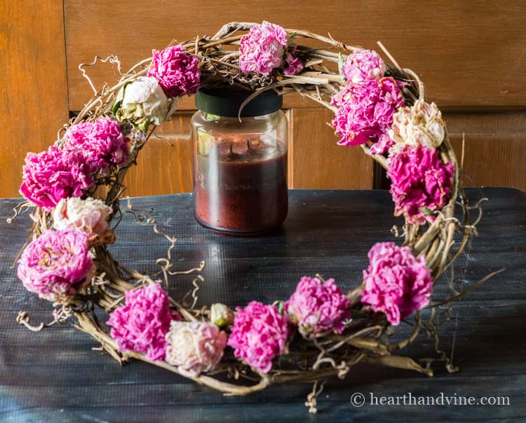 Creating the dried peony flower wreath.