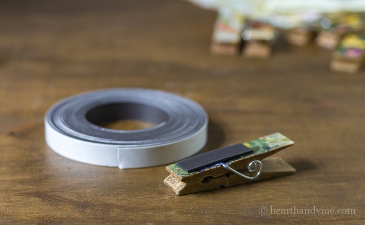 Roll of magnetic tape and piece adhered to back of clothespin.