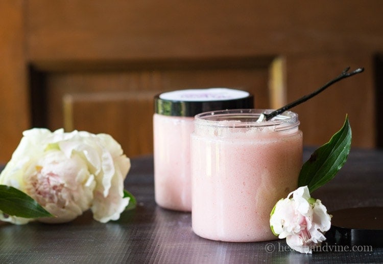 Blush pink sugar scrub jars with peonies.