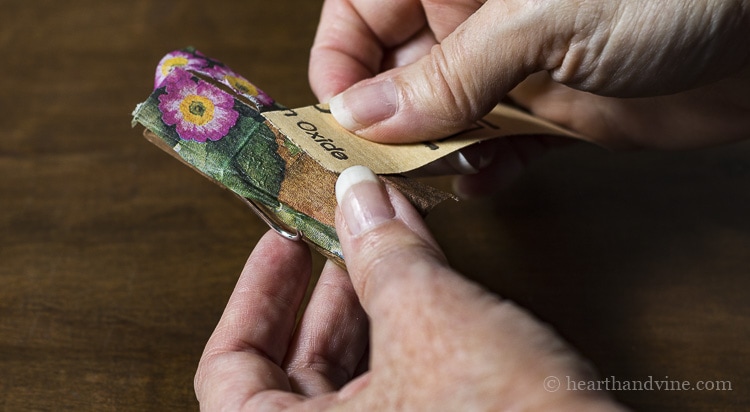 Remove extra napkin with sand paper.