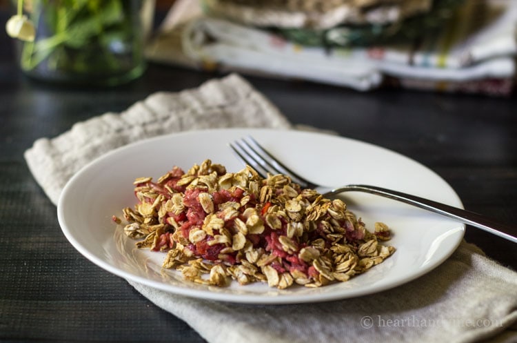 Low sugar strawberry rhubarb crisp on plate