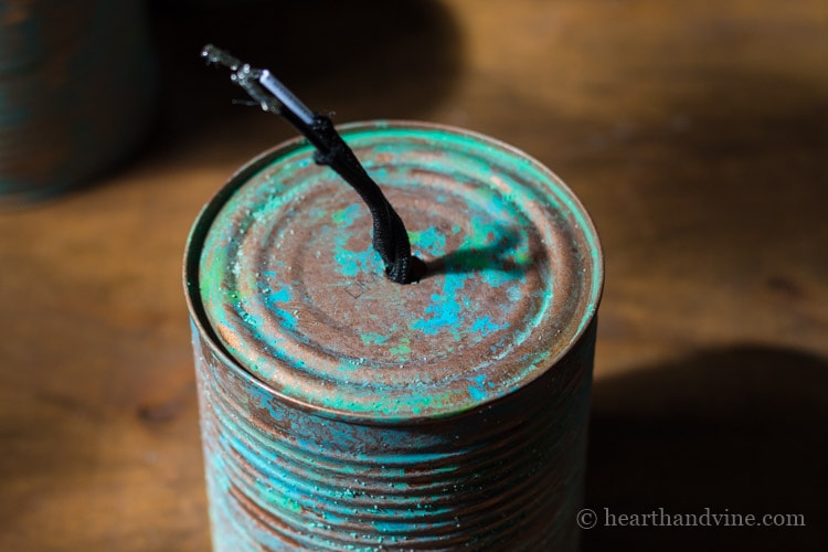 Threading wires through can.