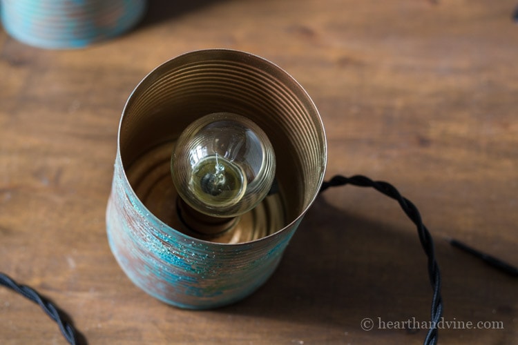 Tin can decorative bulb inside.