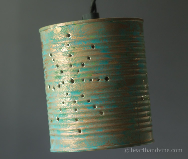 Hanging tin can lantern.