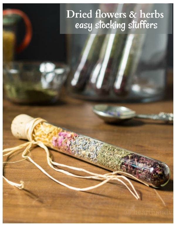 Test tube filled with dried flowers and herbs