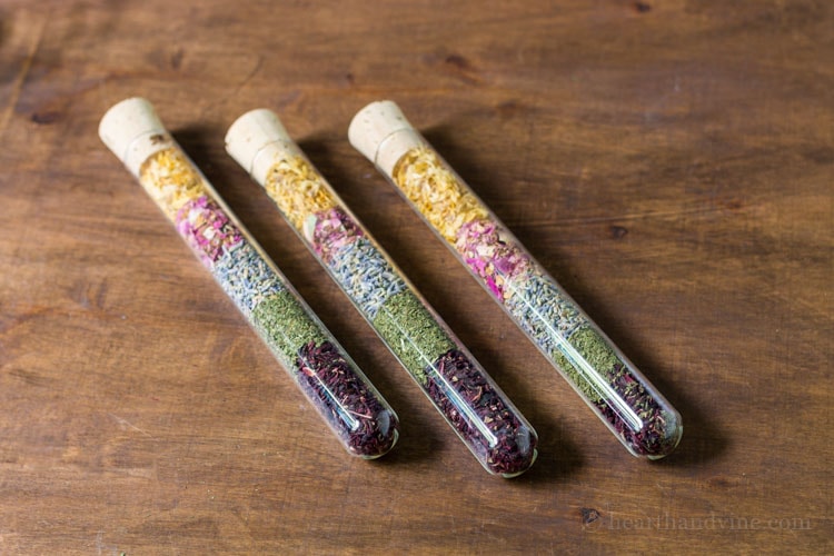 Trio of test tube dried flowers and herbs.