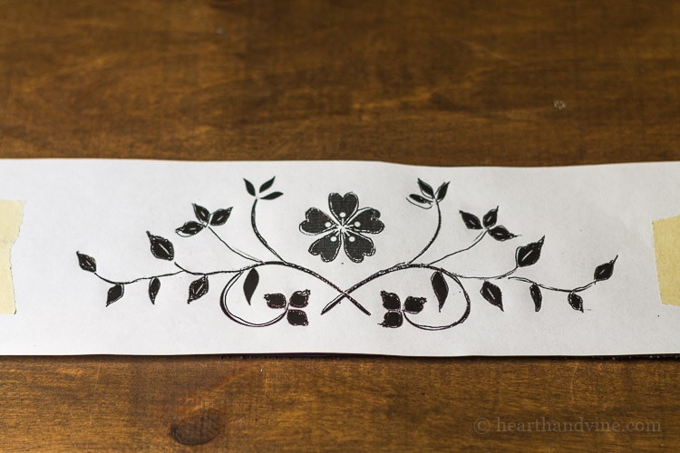 Paper strip with floral pattern.