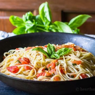 Fresh tomato basil pasta is easy, and a good way to use fresh tomatoes and basil from the garden. It's so delicious you'll want to make it every night.