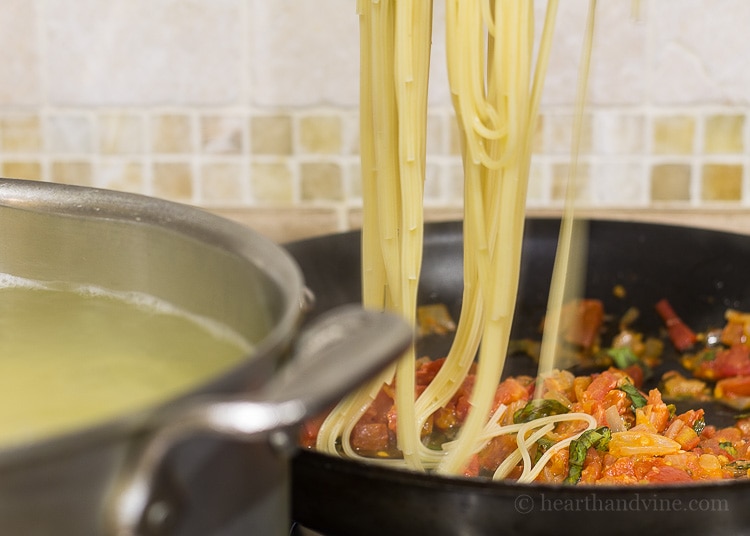 Fresh tomato basil pasta - draining the pasta.