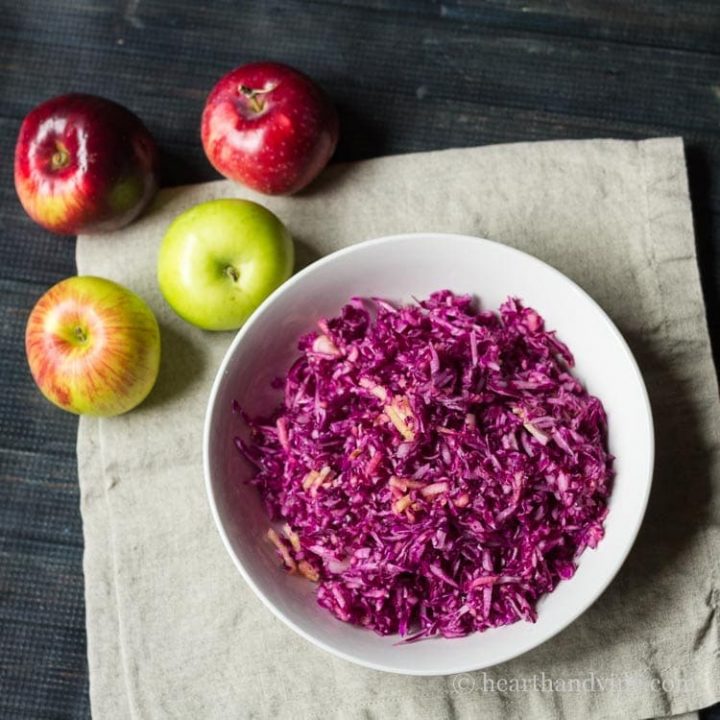 Red cabbage apple slaw is a delicious combination of with a sweet and tart crunchiness, making this a healthy and tasty side dish.