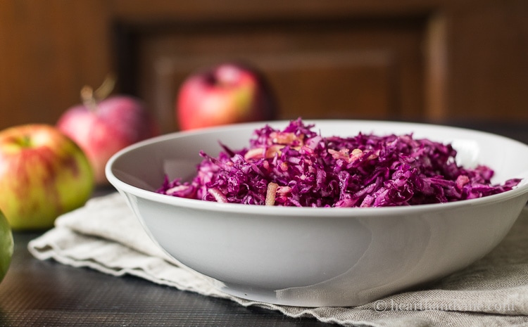 Red cabbage apple slaw is a delicious combination of with a sweet and tart crunchiness, making this a healthy and tasty side dish.