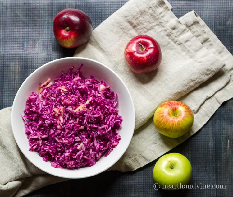 Red cabbage apple slaw is a delicious combination of with a sweet and tart crunchiness, making this a healthy and tasty side dish.