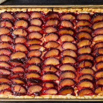 Spiced plum pie made in a rectangle slab style shape can be a beautiful rustic looking dessert that tastes as delicious as it looks.