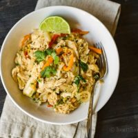 This burrito bowl recipe has wonderful thai flavors that you can easily make at home, with chicken, cilantro and fresh lime, for a tasty dish.