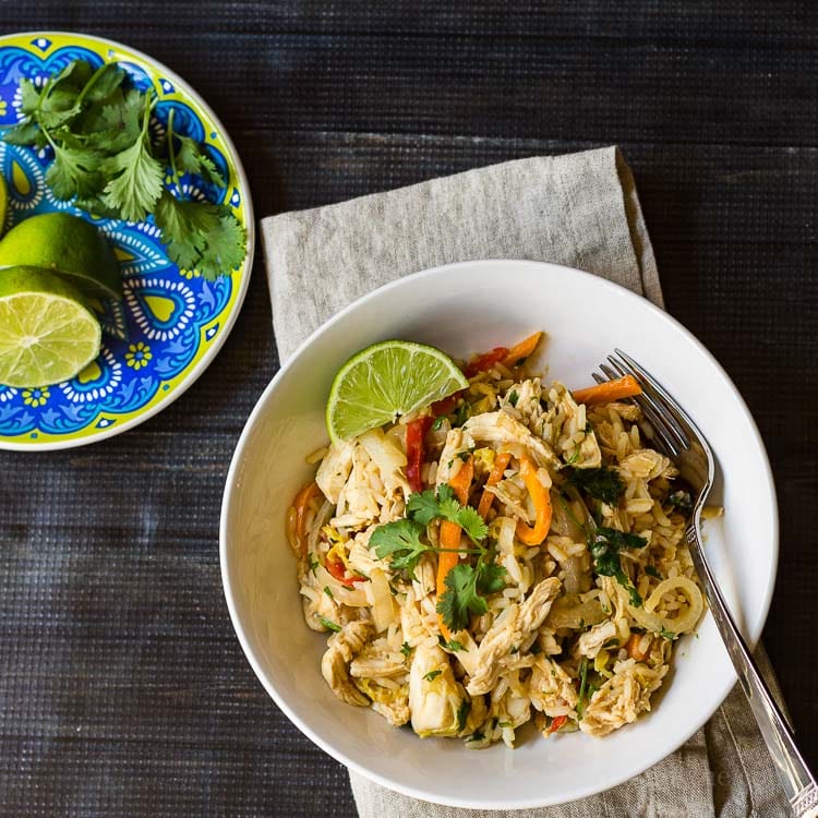 This burrito bowl recipe has wonderful thai flavors that you can easily make at home, with chicken, cilantro and fresh lime, for a tasty dish.