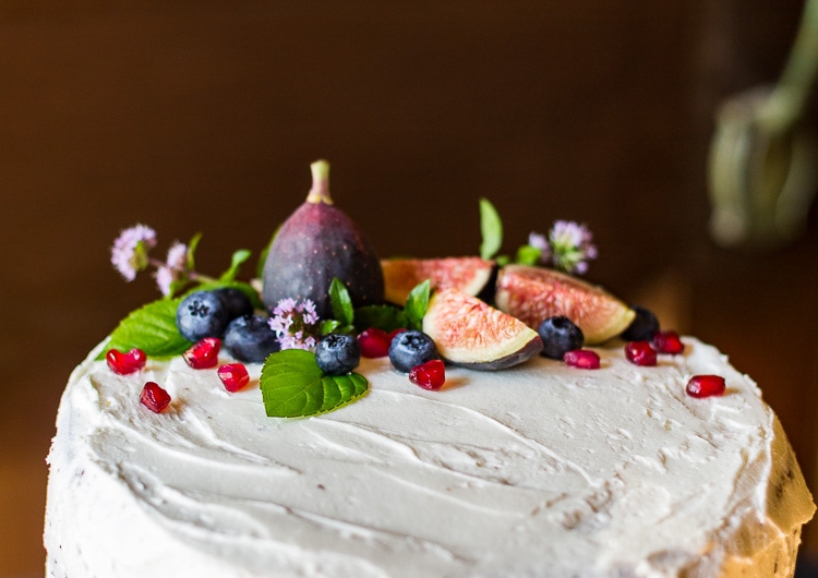 Naked cake with fruit and flowers