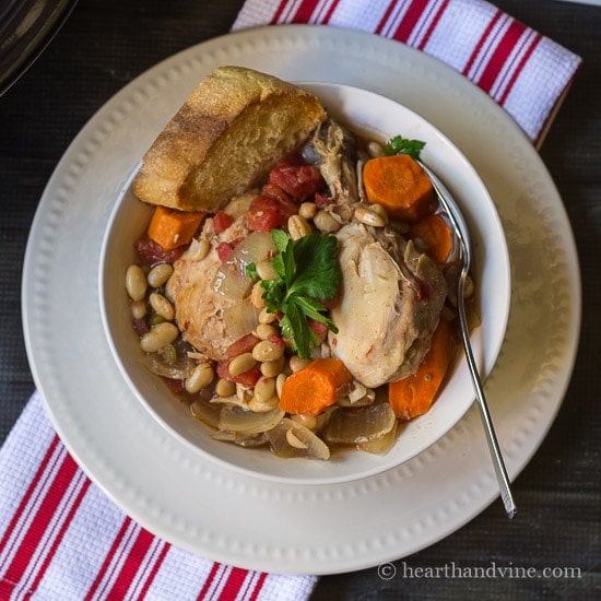 This slow cooker chicken cassoulet recipe is filled with rich bold flavors and simple ingredients, inspired by the French countryside.