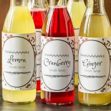 three types of simple syrup, lemon, cranberry & ginger