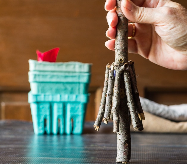 Building twig Christmas tree first layer.