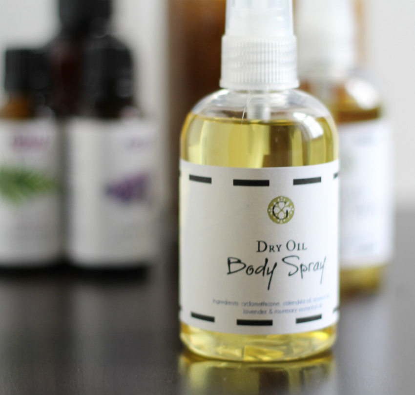 Bottle of dry oil body spray